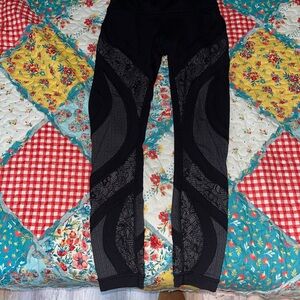 Lululemon Athletica Black Leggings with lace detailing size 4